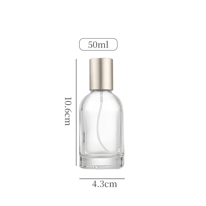 Envase de perfume vacío, botella de spray de alta gama, botella de perfume recargable de vidrio transparente de 30 ml, sensación de alta gama, listo para venta al por mayor.