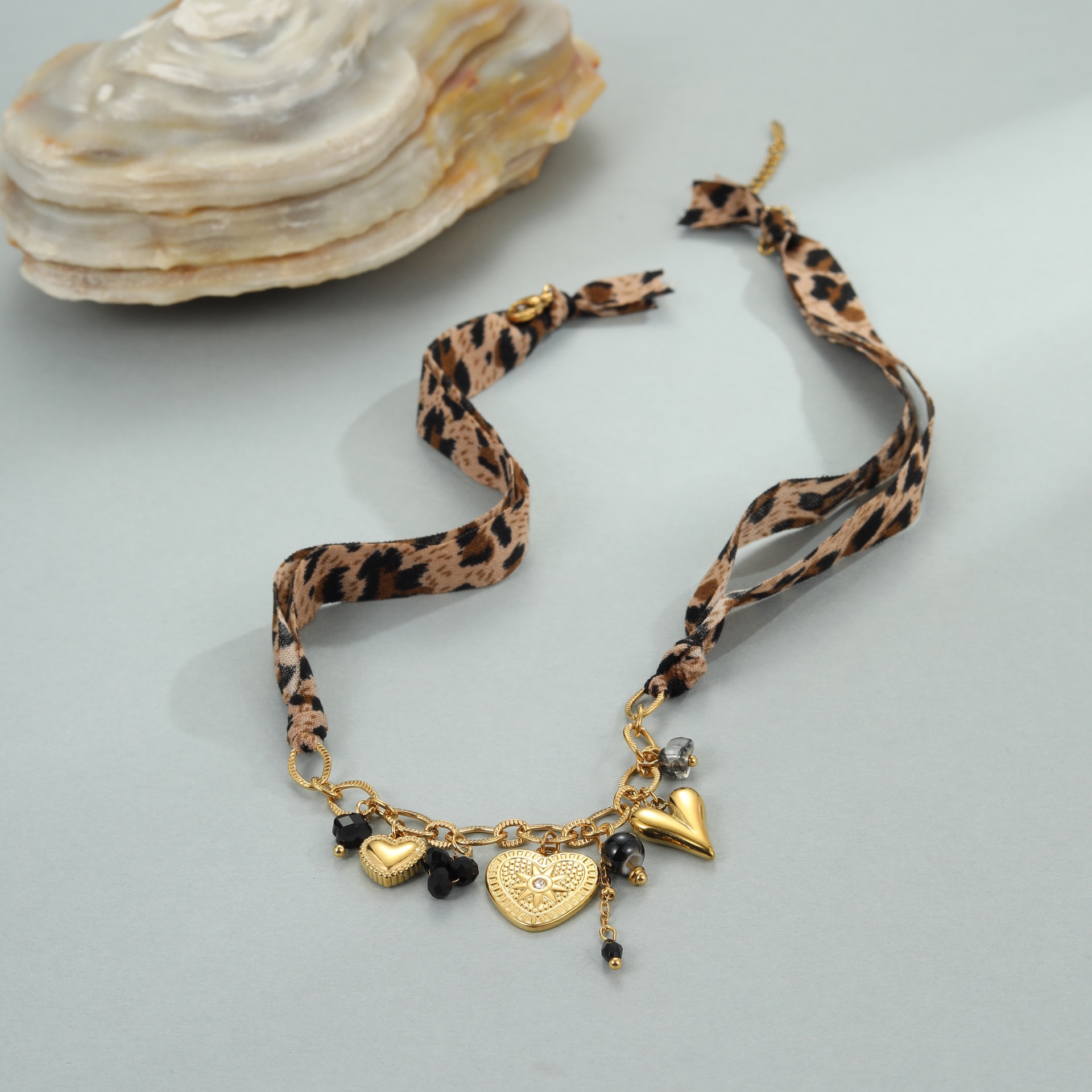Serie di gioielli con stampa leopardata, orecchini ad anello, orecchini a bottone, collana, ciondolo Love Sun, orecchini in acciaio inossidabile, anello in acciaio al titanio, gioielli per le orecchie_voghion.com