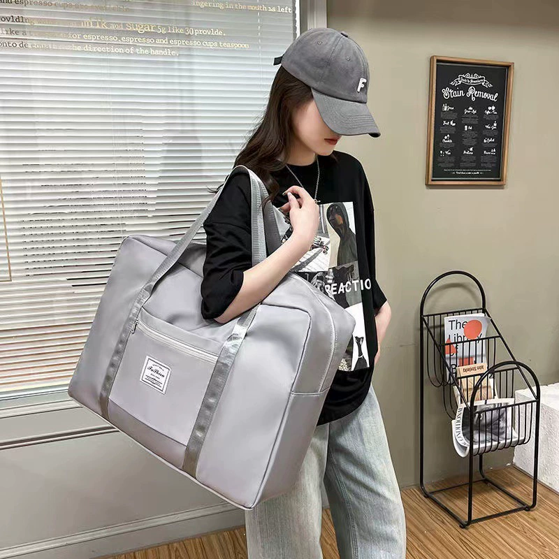 Capacious fashionable luggage travel bag to go out, worn on the shoulder