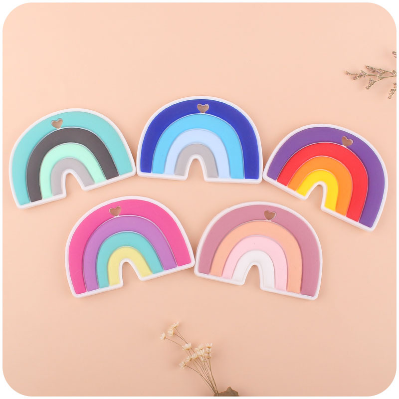 Bebé de dibujos animados clip de arco iris de silicona calmante bebé de dibujos animados arco iris de silicona teether palo de juguete