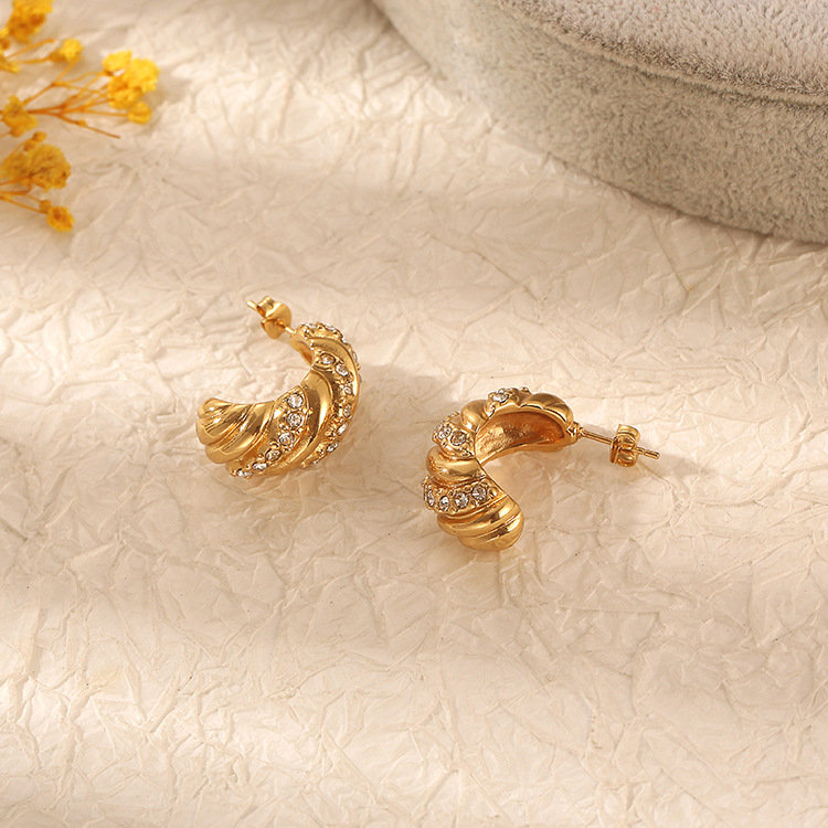 Estilo francés europeo y americano bolsa de cuerno espárragos pendientes especiales transfronterizos Luz de lujo de alto temperamento pendientes de las mujeres de acero inoxidable diamante