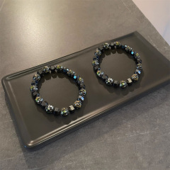 不規則な黒胆石は手串男ヒップホップデザインのブレスレットをつなぎ合わせて高級感のあるファッションのシンプルなアクセサリーを作ります。