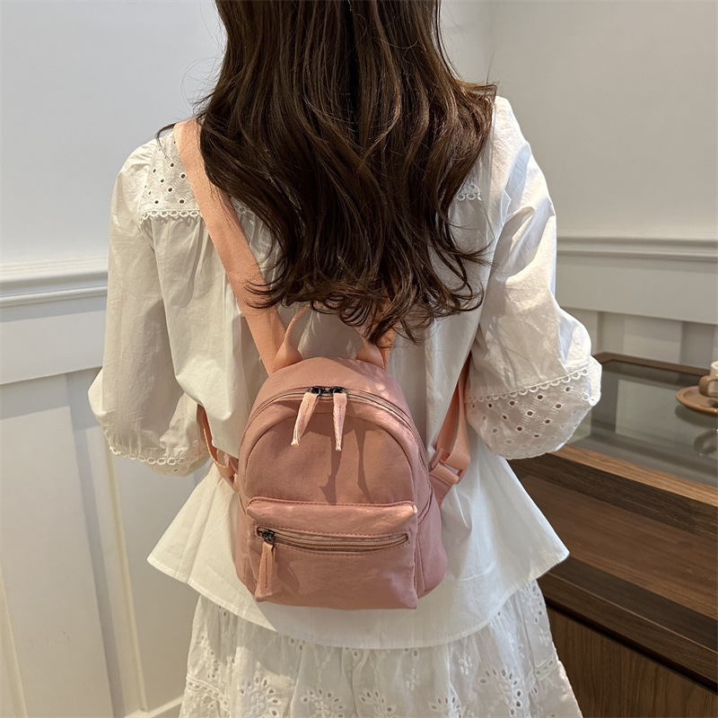 Mochila mini 2026, estilo japonés y coreano, informal, de lona, para estudiantes, de color sólido, versátil, para tabletas