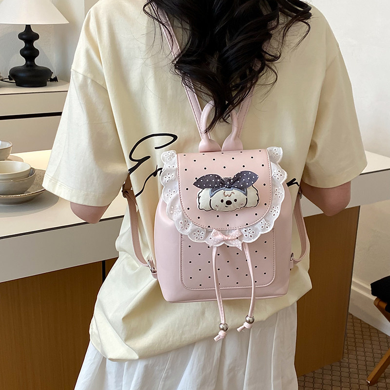 Mochila casual mochila de verano dibujos animados 2026 encaje versátil mochila escolar de mujer de viaje nuevo lindo punto de onda popular