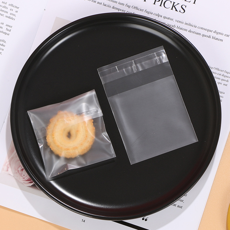 Bolsa autoadhesiva translúcida esmerilada gruesa bolsa de galletas copo de nieve pastel de carne crujiente bolsa de embalaje de plástico bolsa de autosellado de viscosa