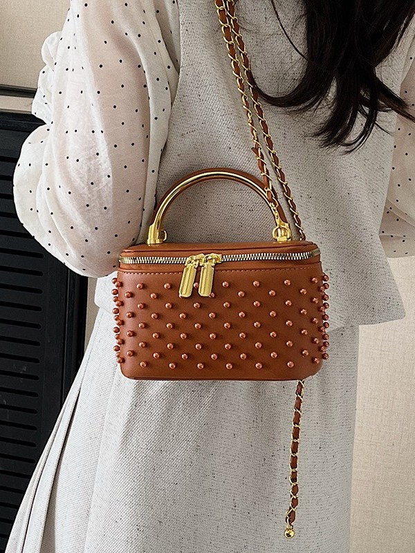 Caja de mano de alta sensación, bolso cuadrado pequeño para mujeres 2026 nueva moda transfronteriza nicho de moda ligero de lujo cadena mochila