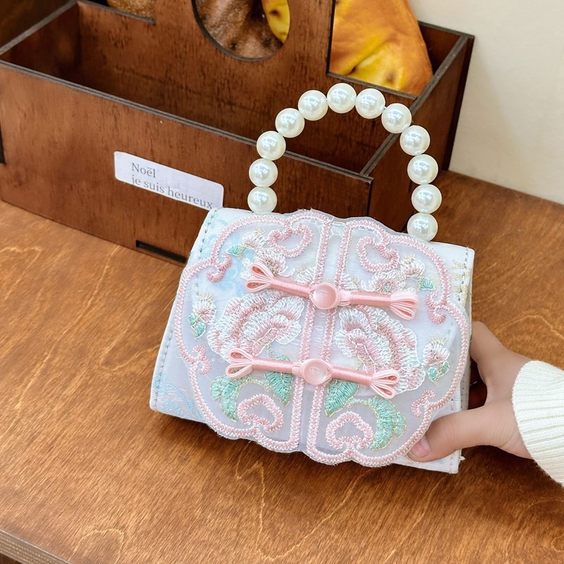 Nuevo estilo chino retro bolso de perla de viento 2025 bolso de cambio sobre rojo bolso de princesa de niñas Hanfu
