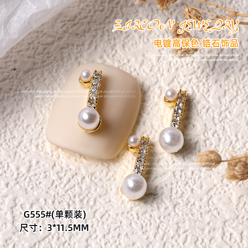 Nueva luz de la celebridad Internet lujo circón Super Flash Perla Cadena amor mariposa colgante uñas Oro Cielo Estrellado Estrella Diamantes