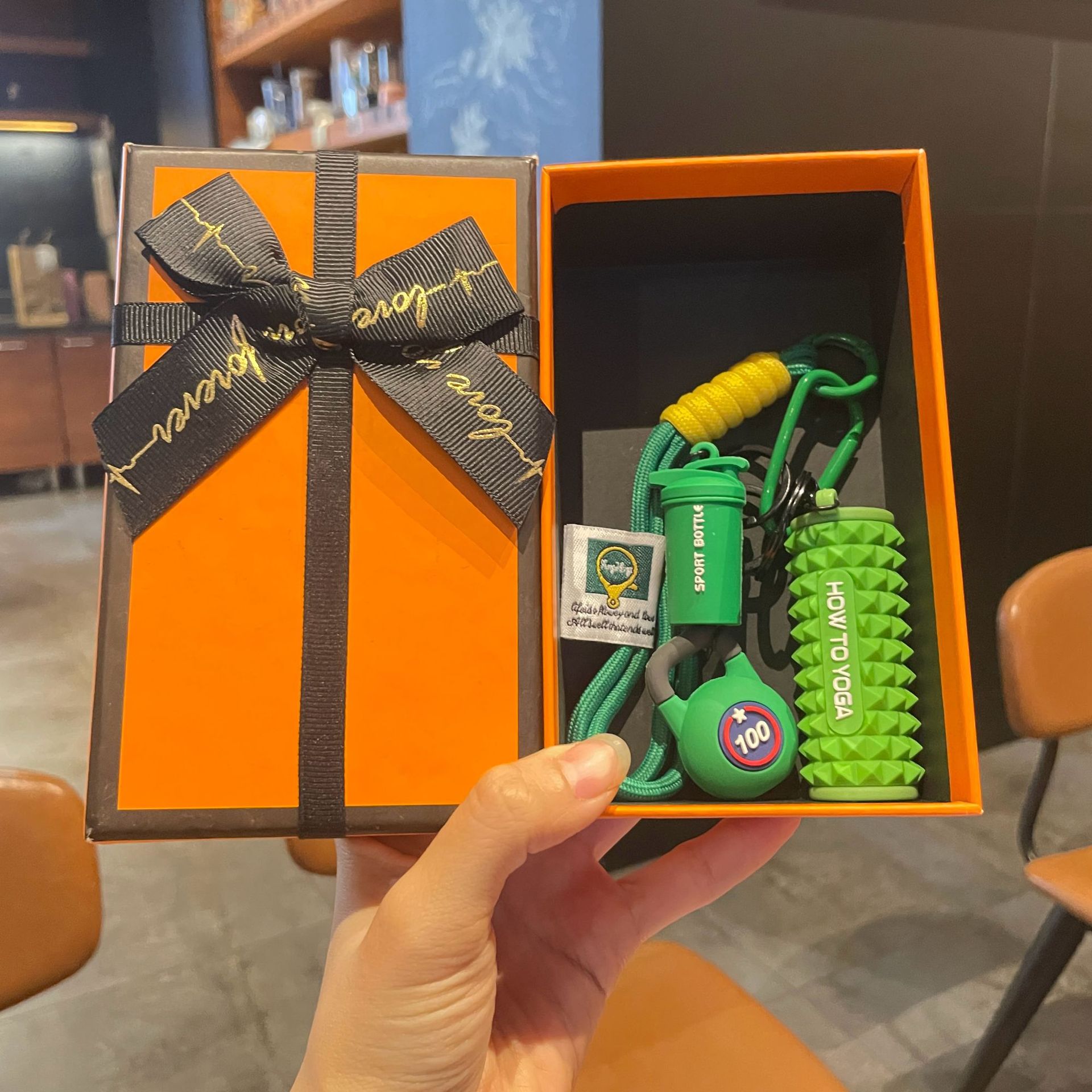 Green set for yoga from foam, orange gift box