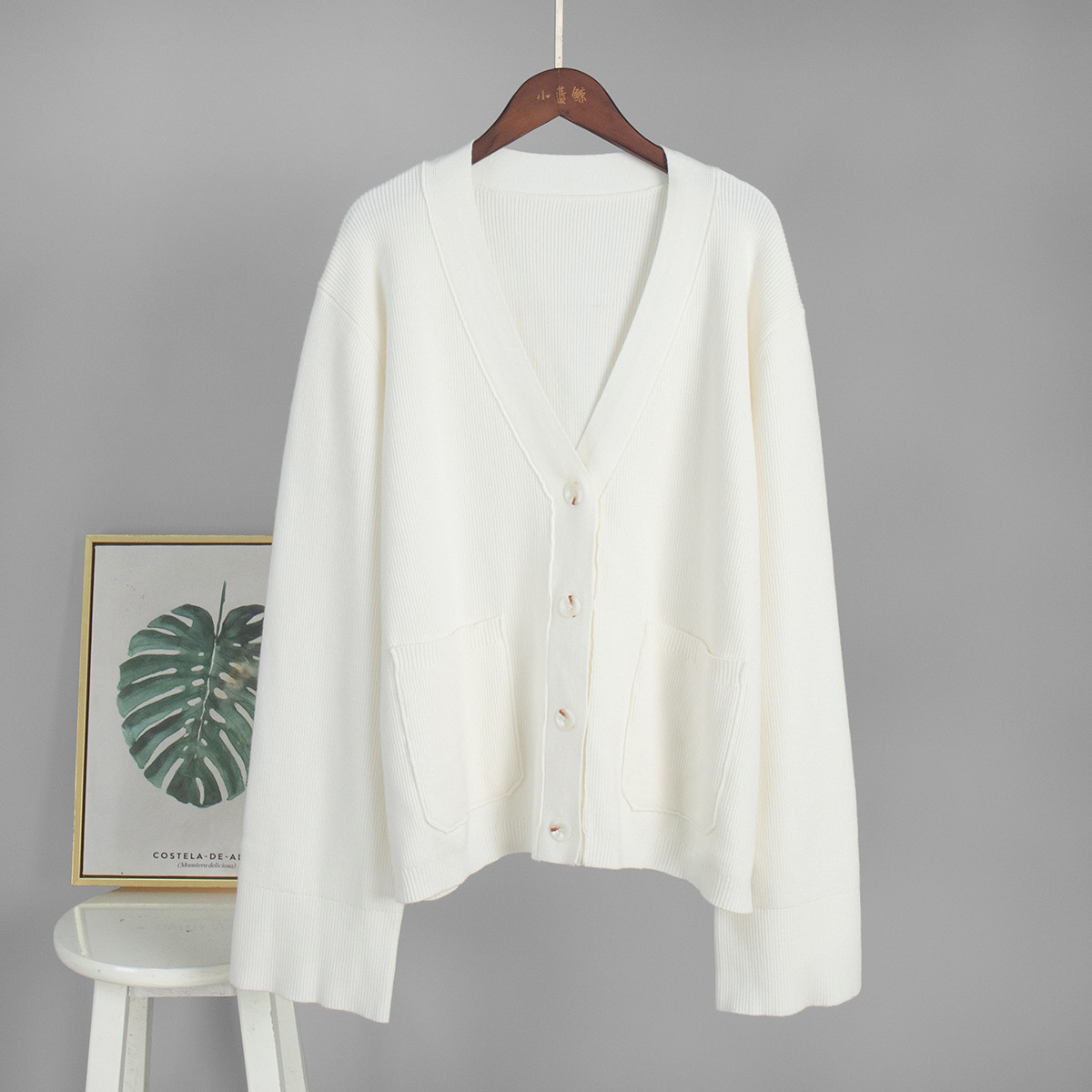 Cardigan de punto suéter suelto transfronterizo Europa y los Estados Unidos otoño / invierno 2025 Cardigan de punto de cuello V suéter suelto de viento flojo mujeres