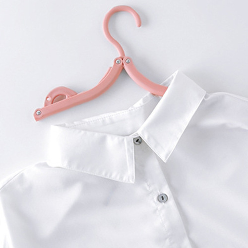 Wholesale 8 folding clothes hangers for adults and children, portable multi-functional home traceless anti-slip clothes plastic hangers