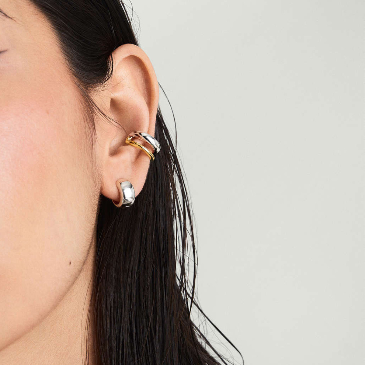Europa y los Estados Unidos transfronterizos en el estilo de moda simple 18k oro acero inoxidable color de doble capa un par de joyas de orejas