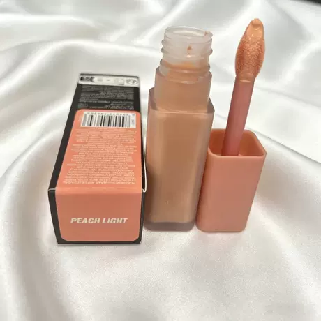 Orange concealer peach light