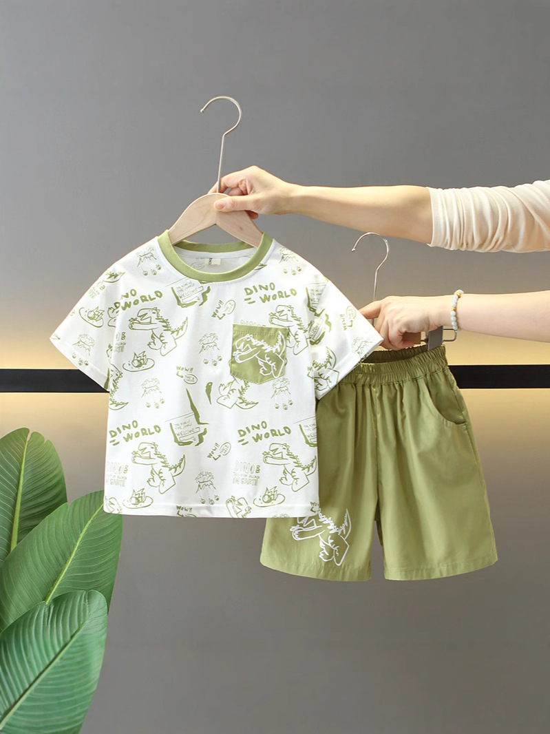 7277 Traje de verano para niños 2025 nuevo estilo estilo occidental dibujos animados para niños dinosaurio de manga corta bebé verano delgado dos piezas