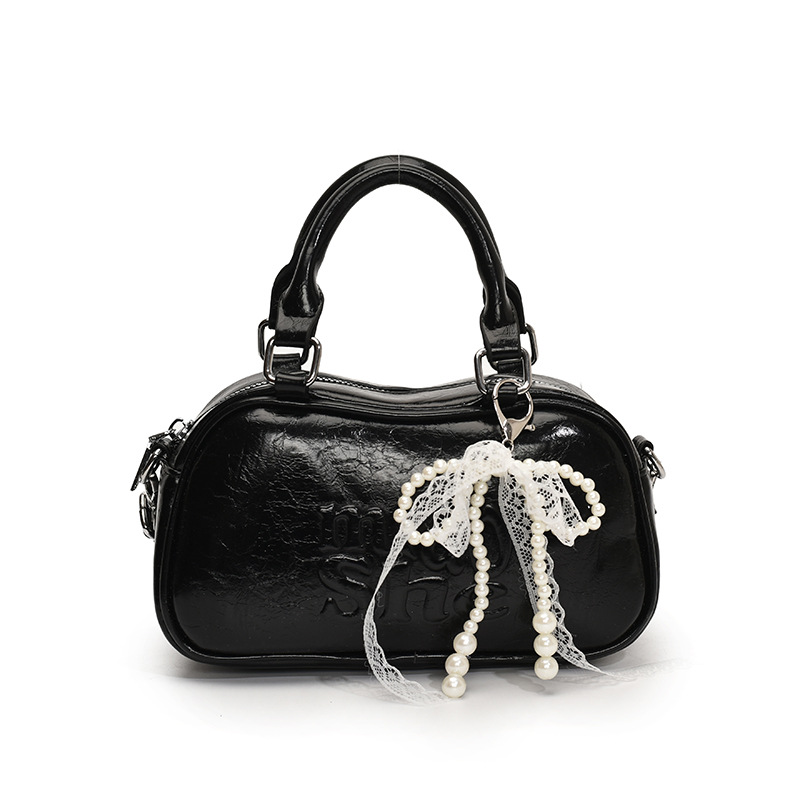 Versión coreana del bolso de bolos de mano para mujer 2025 nuevo bolso de hombro de moda de moda bolso de mensajero popular casual de todo fósforo