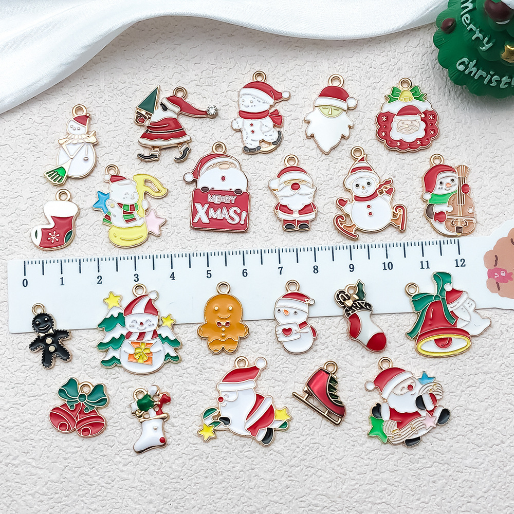 混50个圣诞滴油合金diy饰品配件 圣诞老人雪人铃铛麋鹿手链挂件详情7