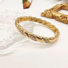 亚马逊精致镶钻合金手镯椭圆弹簧可开欧美时尚小众镀金新款手环