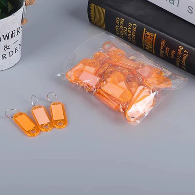 Бирка-ключ ABS, прозрачная цветная, с местом для надписи, 4,9×2 см