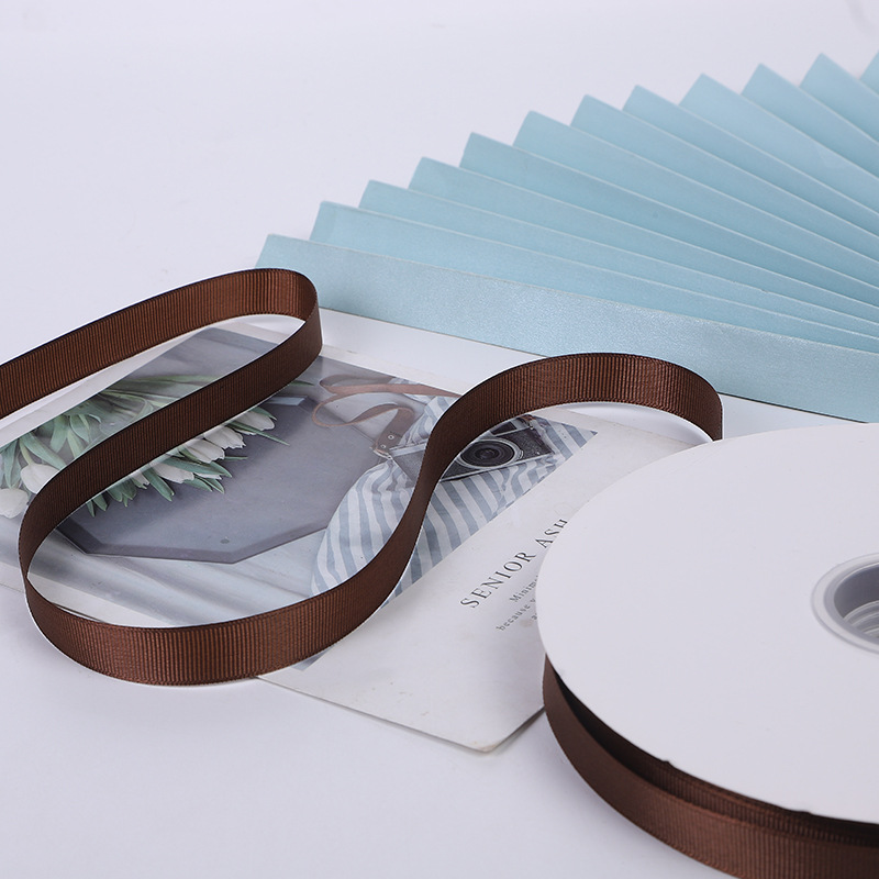 Suministro directo de fábrica cinta roscada cinta marrón caja de regalo embalaje bolso cinta accesorios de ropa cinta al por mayor