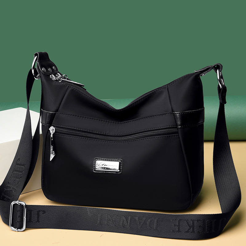 Bolsa de mujer 2023 nueva bolsa de mensajero de hombro de tela Oxford impermeable bolsa de Madre de mujer de mediana edad de gran capacidad multicompartimento
