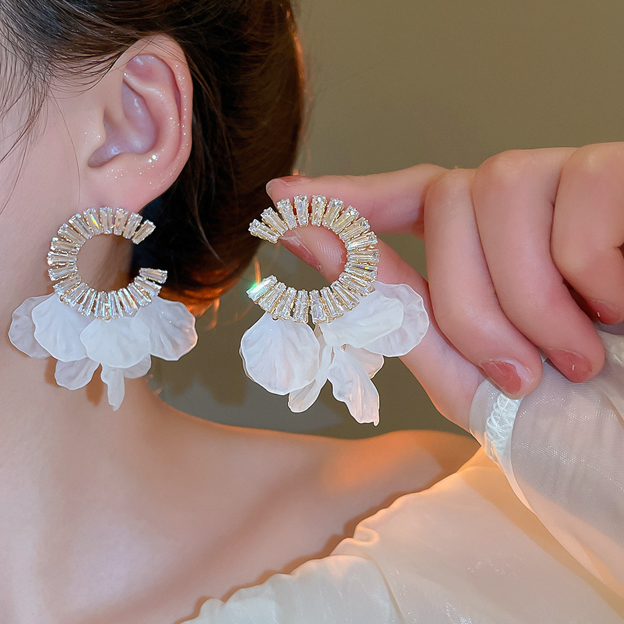 Pendientes de flor de lazo elegante de súper hada de plata Pendientes de moda de lujo ligero francés Pendientes de todo fósforo dulce de estilo literario