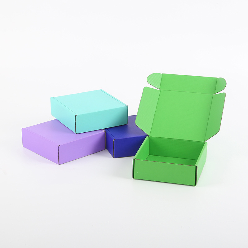 Caja de avión de color Caja de embalaje verde Caja de embalaje de cosméticos Caja de embalaje de logística expreso Caja de cartón corrugado Logotipo imprimible mayorista