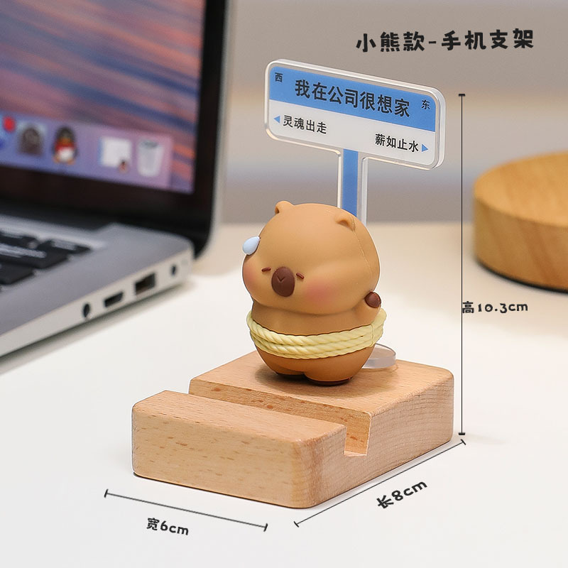 汗を流して携帯のスタンドのデスクトップの置物のステーションの情緒が安定しています。|undefined