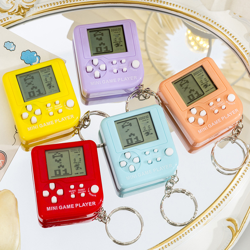 Mini consola de juegos de mano clásica nostálgica Tetris juguetes mochila colgante llavero transfronterizo