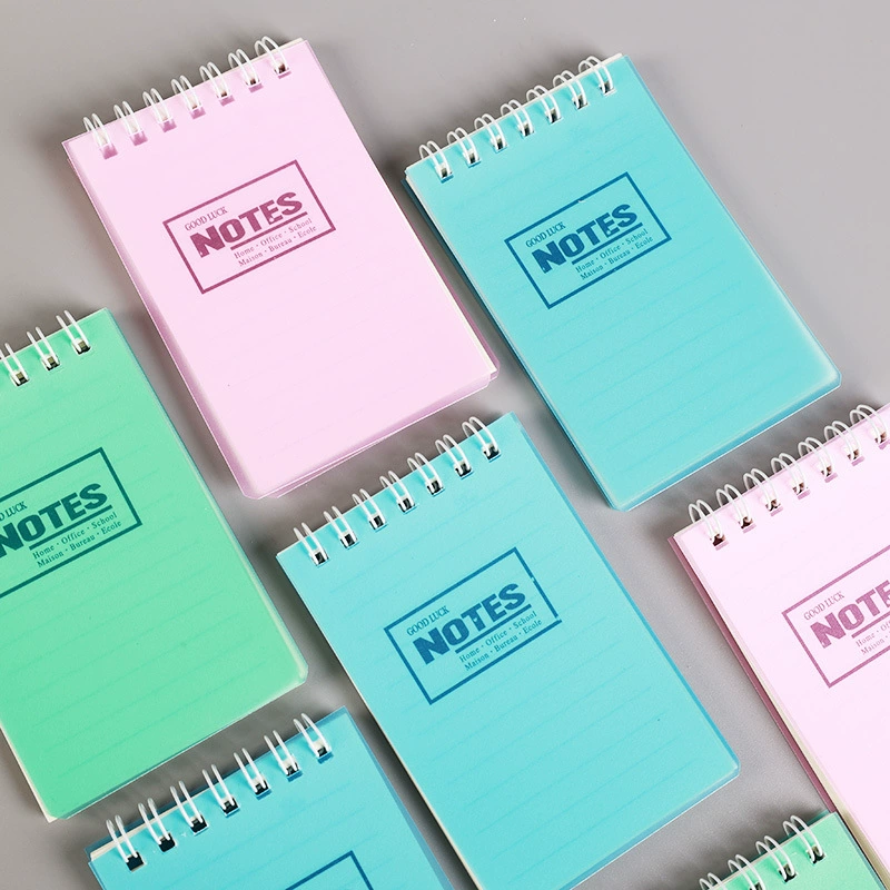 A7 spiral pocket notebook, handheld for elementary students, mixed pastel covers, wholesale 100‑pack