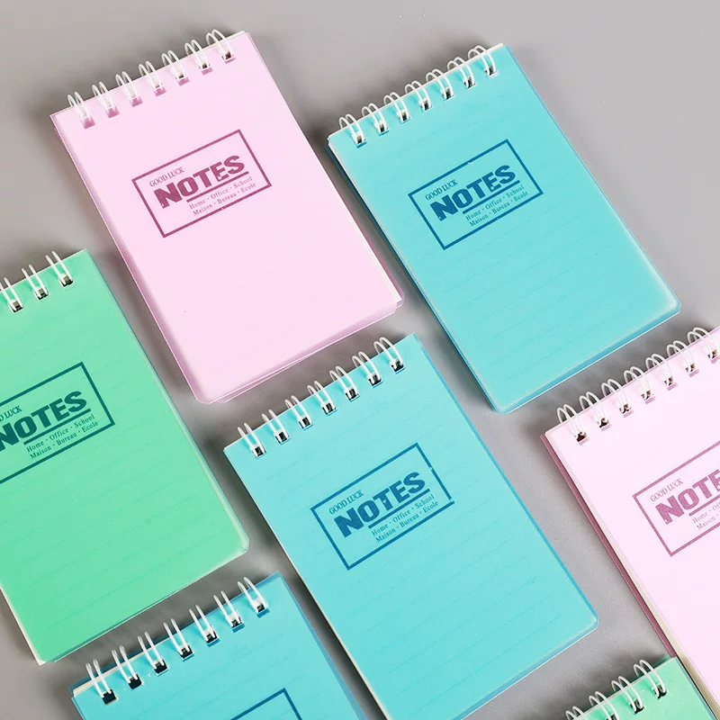 A7 spiral pocket notebook, handheld for elementary students, mixed pastel covers, wholesale 100‑pack