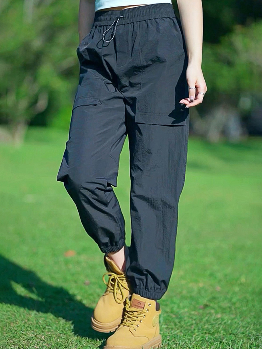 Fábrica directa de pantalones secos rápidos para hombres y mujeres de verano nuevos pantalones ligeros y transpirables parejas sueltos de pies deportivos casuales de nueve puntos