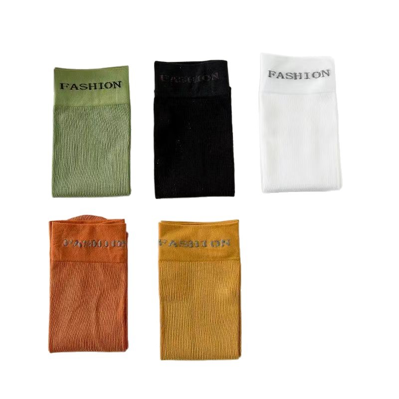2025 nuevos calcetines de moda personales coreanos de color caramelo primavera y verano calcetines de algodón delgados versátiles calcetines de viento universitarios