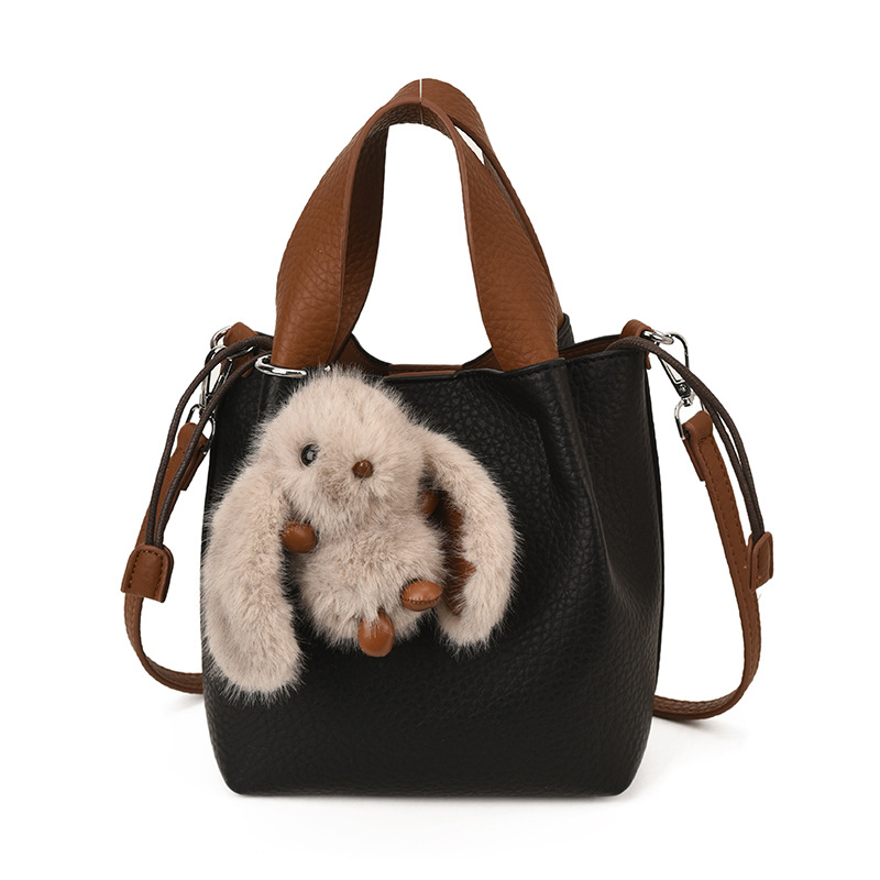 Bolso de mano retro de alto nivel, bolso de balde de agua universal para mujeres 2025, nuevo estilo coreano de invierno para niños y madres, bolso de hombro.