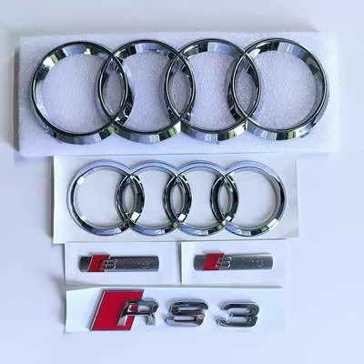 Audi A4L modified with RS4 black emblems, S3 four-ring front emblems, Sline side emblems, and S4 sport rear emblems, all made with original factory materials (Car logo) - standard-rs3