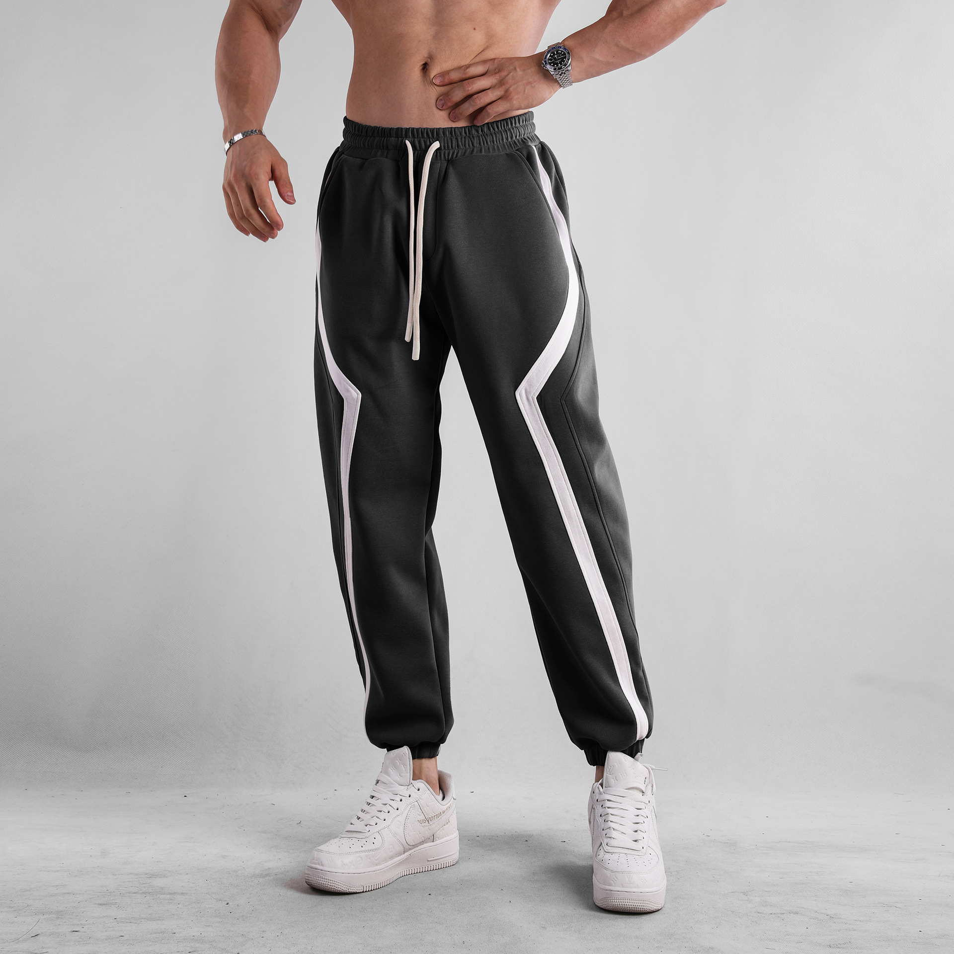Otoño e Invierno a rayas americano casual deportes europeo y americano más tamaño pantalones sueltos pantalones de chándal muscle hombres deportes nueva moda