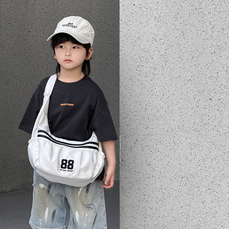 Versión coreana del bolso de hombro para niños y niñas de moda, bolso de mensajero para niños de gran capacidad digital de estilo occidental, bolso de niños a rayas de moda