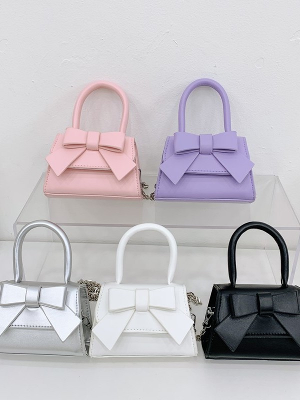 Bolso de mujer 2025 tendencia de primavera nuevo arco de moda para niños bolso de hombro de estilo extranjero bolso de mano