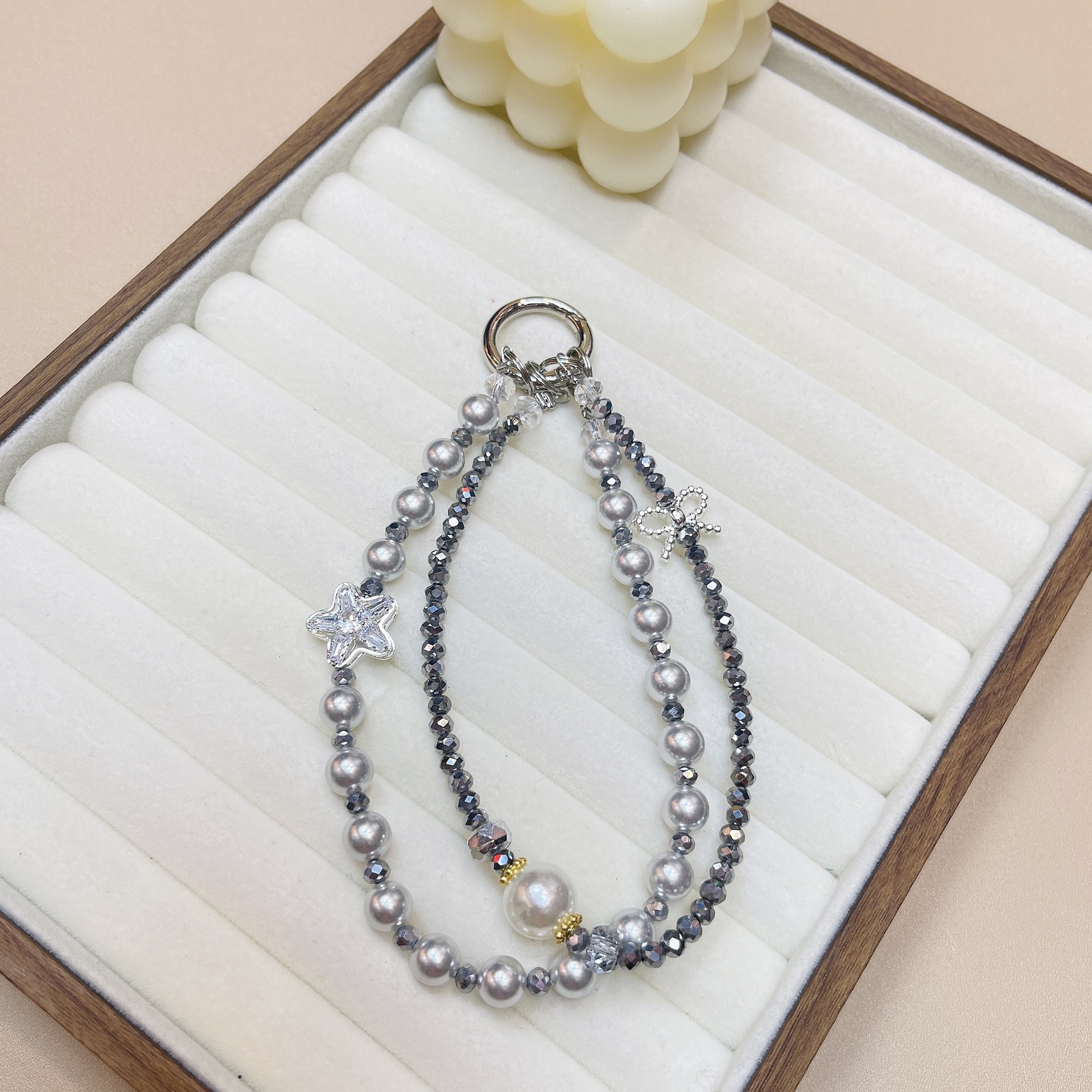 Cordón de teléfono móvil de doble cadena de cristal de moda cordón de muñeca con cuentas de alta gama colgante de estrella llavero de perlas cabello de una pieza