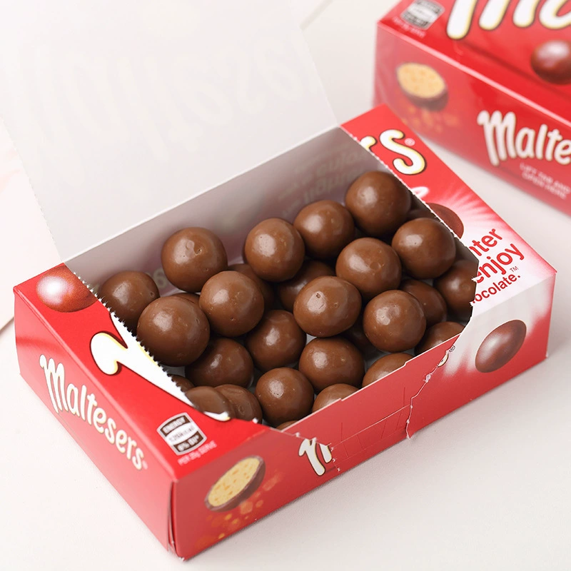Шоколадные конфеты Maltesers коробка 90 г — молочные или тёмные хрустящие шарики (импорт из Австралии)