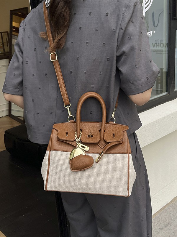 Bolso de tela de mujer color contrastante empalme bolso portátil Kylie bolsa de gran capacidad transfronteriza alta sensación de viaje bolsa de mano