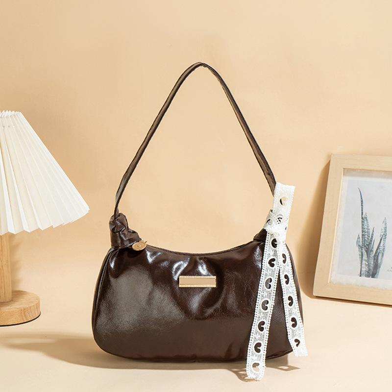 Bolso de cuero PU suave de cuero de aceite 2025 nueva moda universal bolso de moda de mujer bolso de brazo portátil pequeño