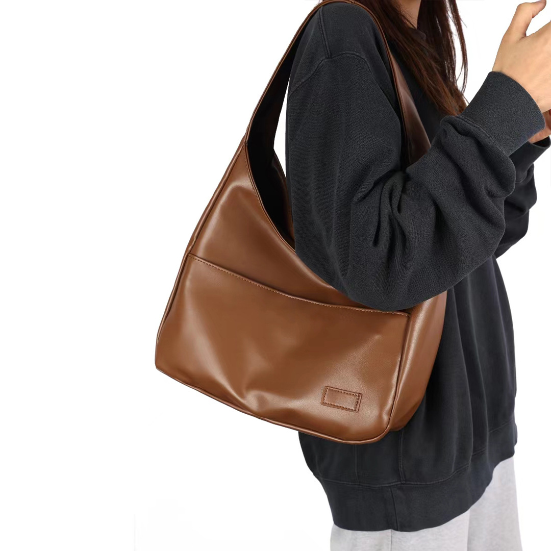 2025 primavera y verano nuevo bolso de alta capacidad comercio exterior transfronterizo estilo caliente bolso femenino cubo portátil bolso de hombro moda