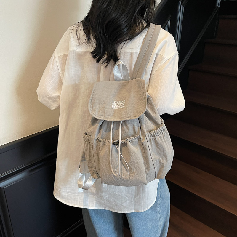 2025 夏の新超軽量防水巾着バックパックカジュアル多用途学生バッグニッチデザインの女性のバックパック|undefined