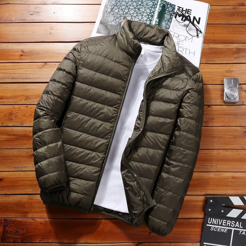 Transfronterizo Tik Tok otoño invierno chaqueta de plumón ligera hombre corto tamaño grande ligero a prueba de frío cálido abrigo de cuello blanco