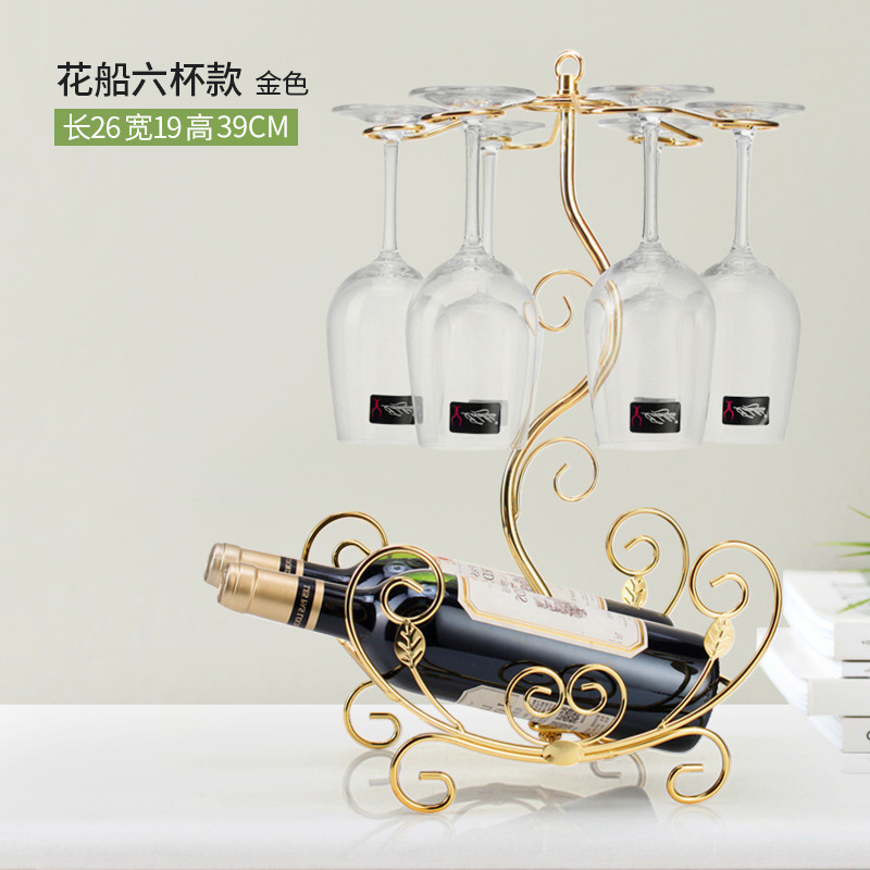 軽くて豪華な風の金色の酒の箱はワインの棚を飾ってワインの棚のワインの杯の棚を並べます。|undefined