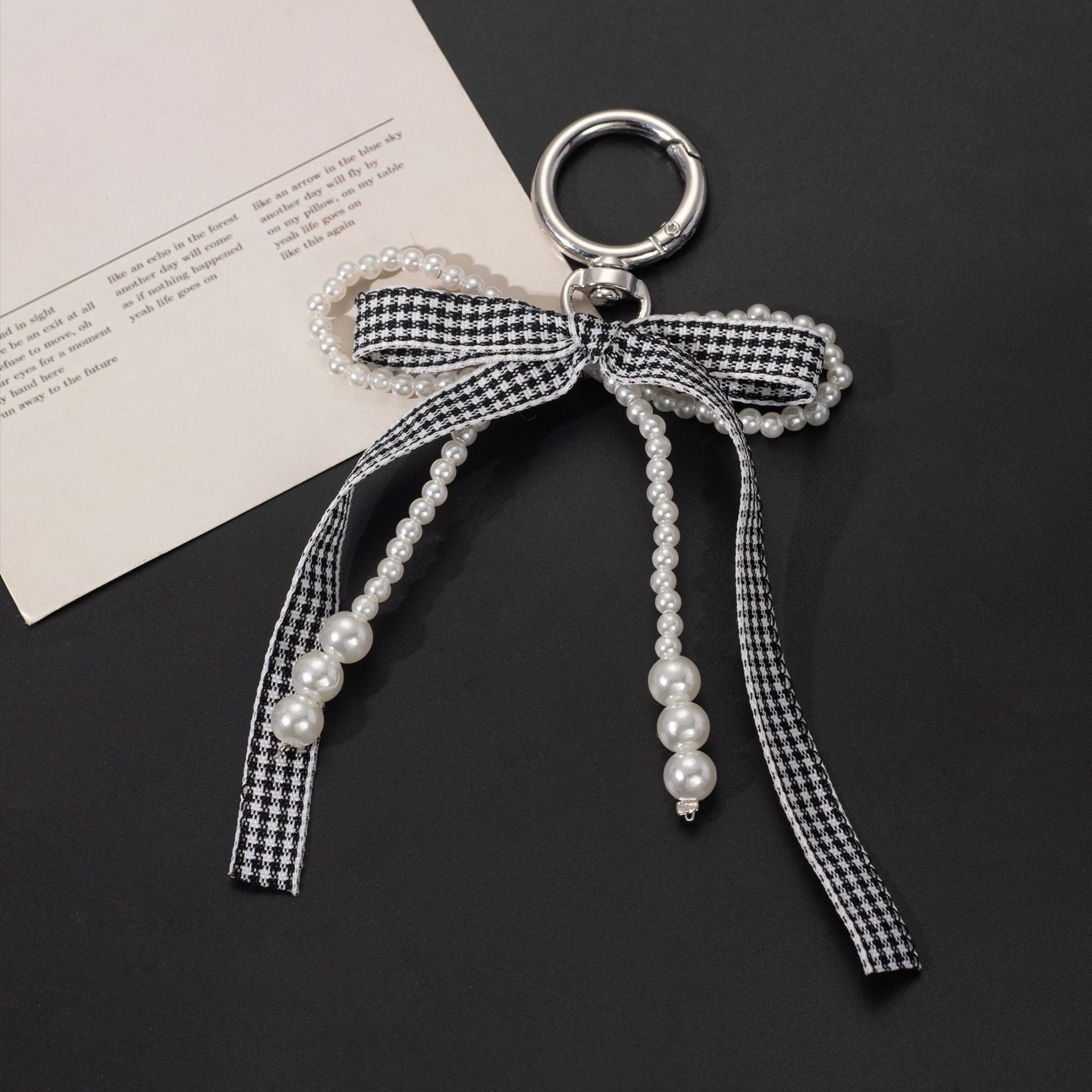 Coreano estricto color curry cinta arco perla bolsos bolsos llavero de encaje dulce bolsos colgantes pequeños vientos fragrantes