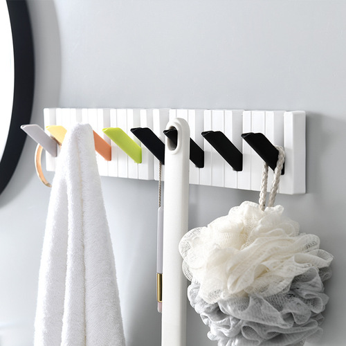 Creative punch-free piano hook for home clothes, hats, bags, umbrella hangers, foldable key hook storage rack