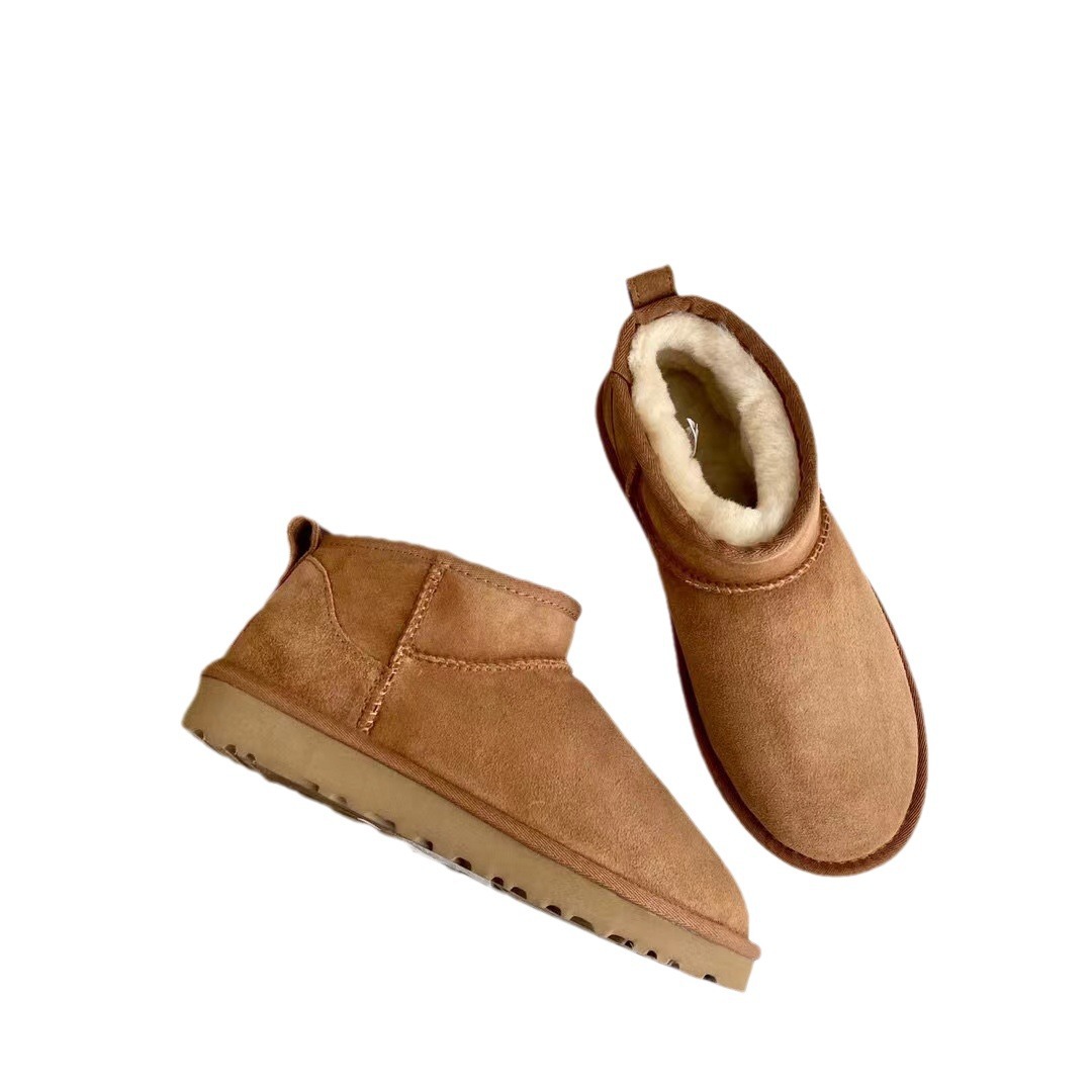 Invierno nuevas botas de nieve Zapatos de algodón noreste corto plano de comercio exterior de las mujeres zapatos calientes gruesos forrados de lana lote de entrega de una sola pieza