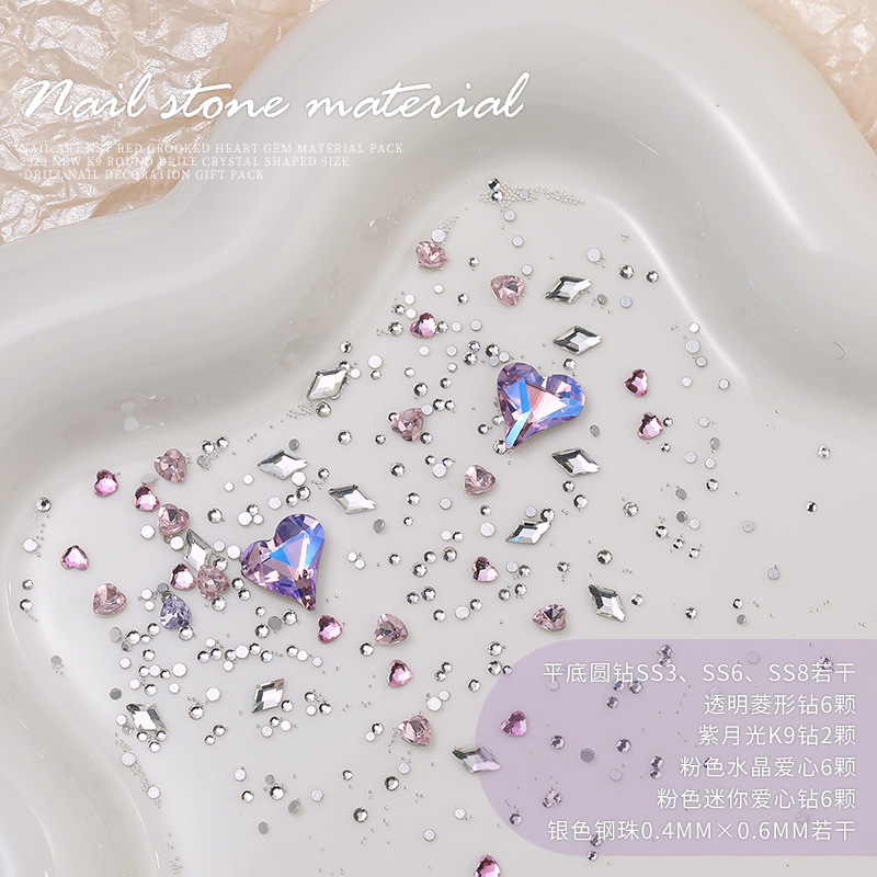 Arte de uñas celebridad en línea corazón torcido gema material paquete nuevo K9 cristal de diamante redondo tamaño especial en forma de diamante decoraciones de uñas al por mayor