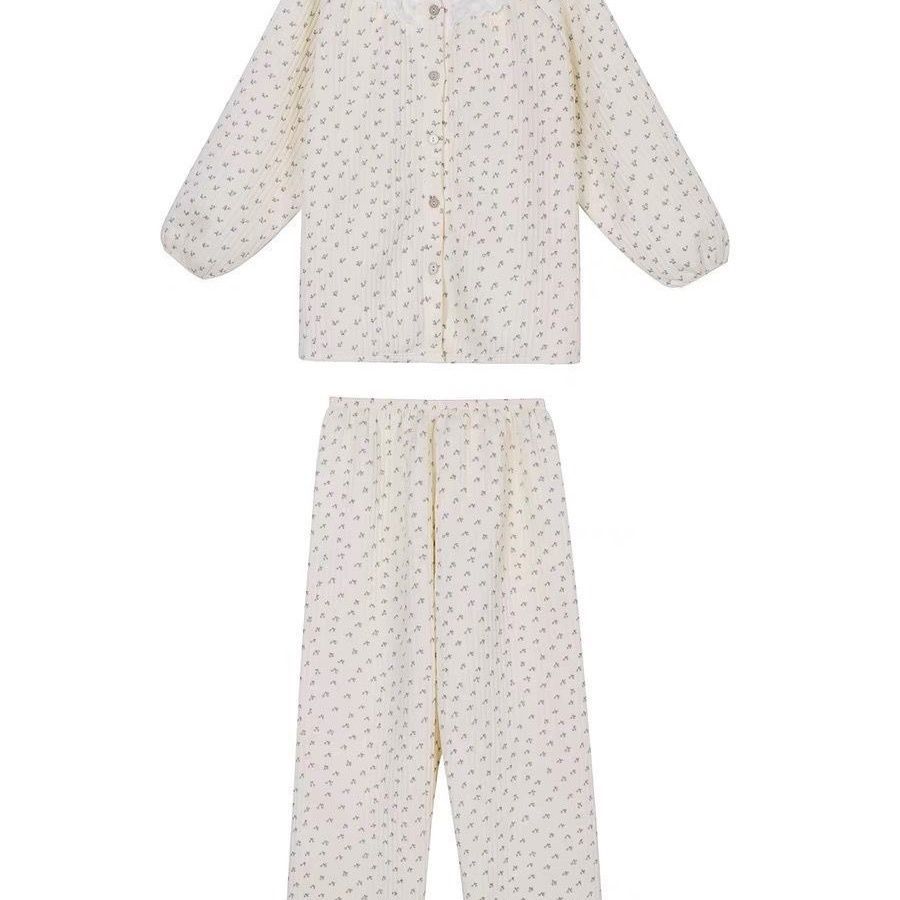 Aumentar el tamaño otoño y invierno nuevo aire de algodón intercalado grueso abrigo pijamas de encaje de flores trituradas set de cuello redondo para mujeres